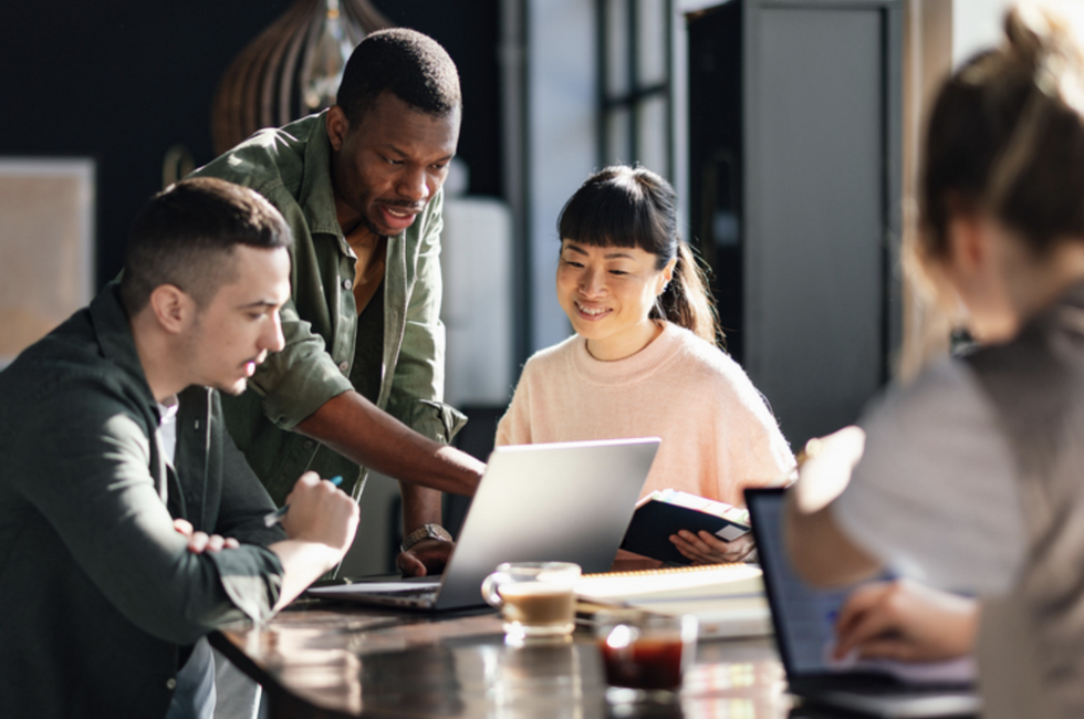 A finance team discussing the Concur alternatives